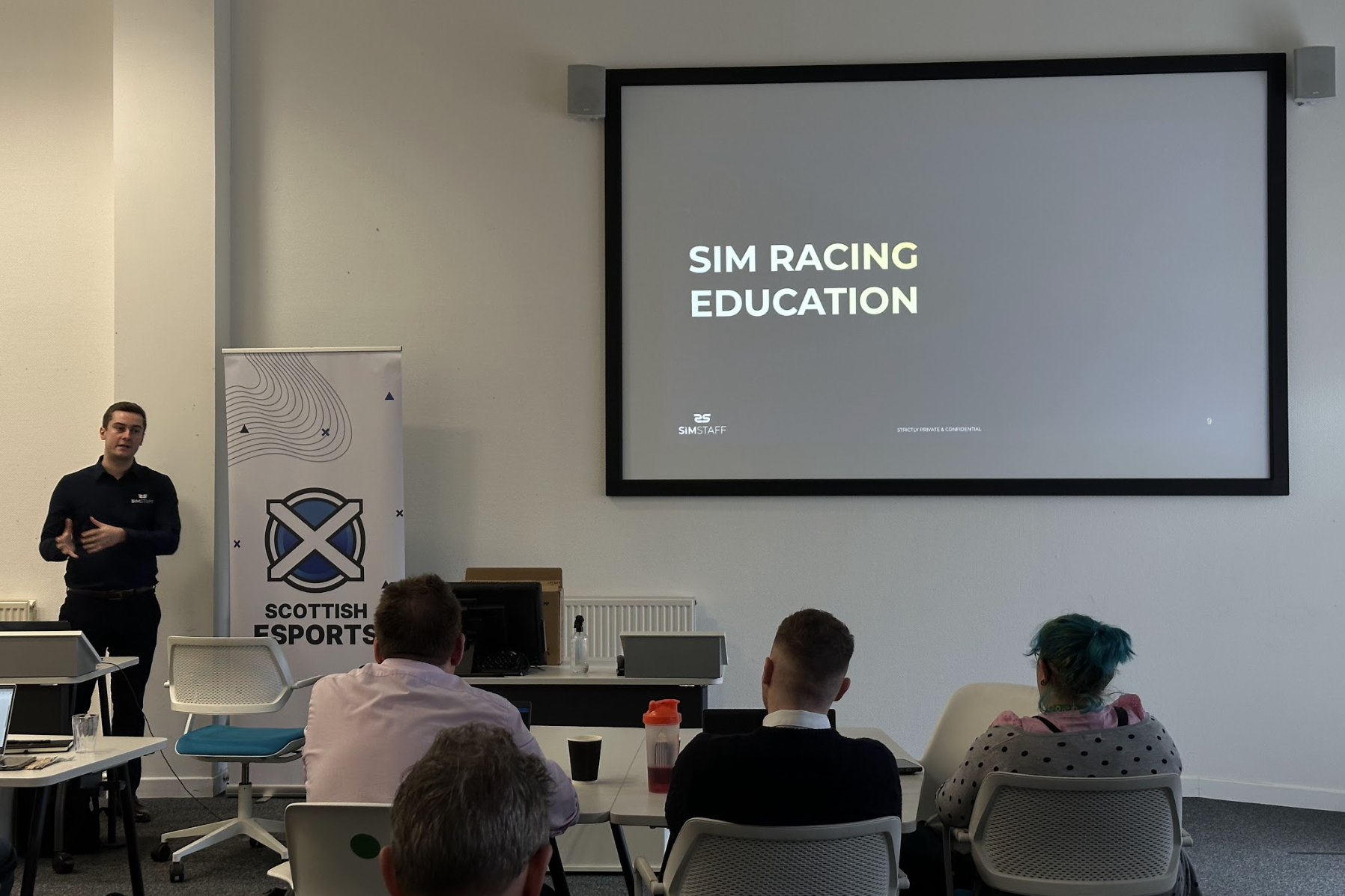 Josh Martin of SimStaff presenting on Sim Racing in Education